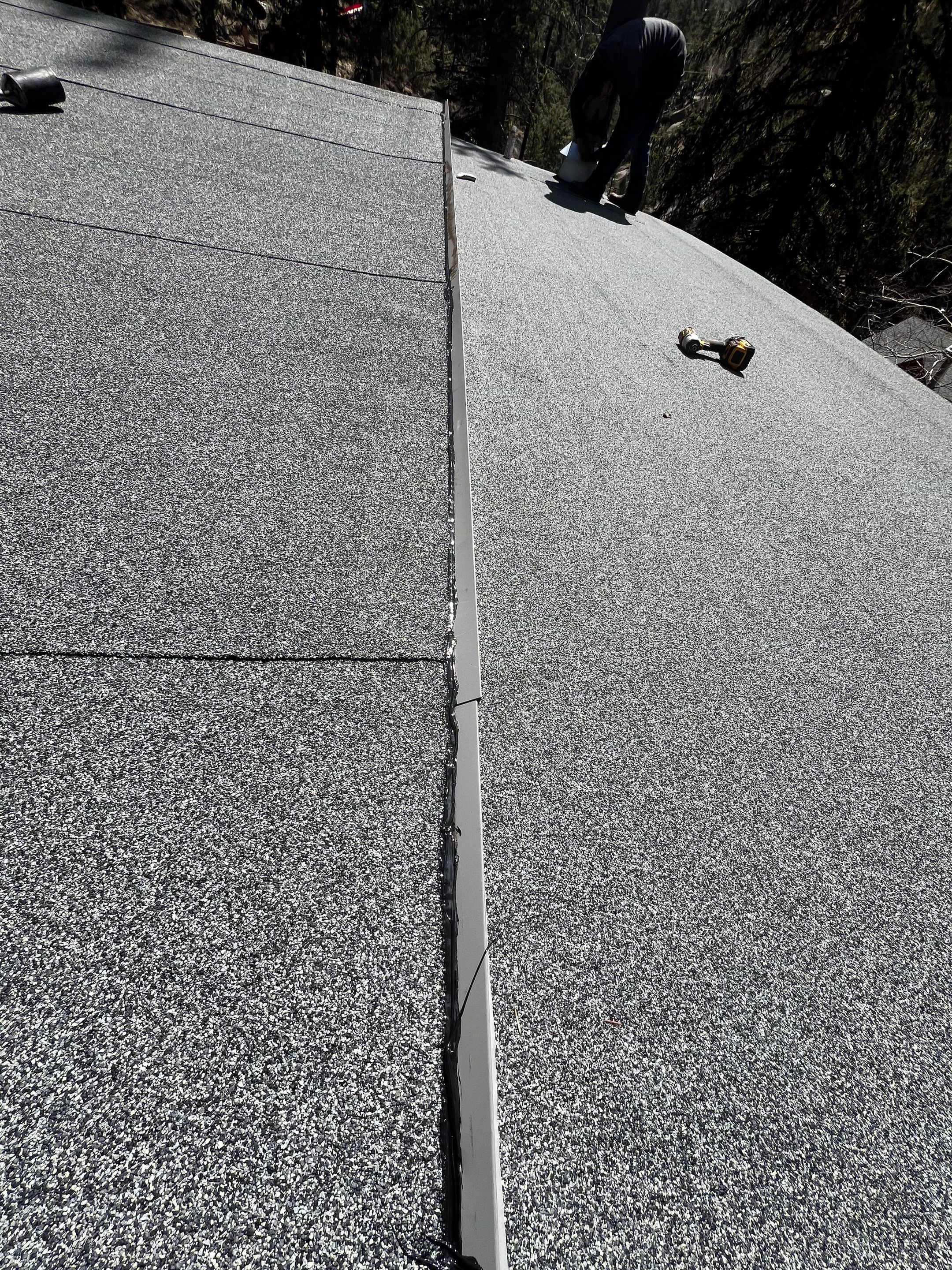 Residential Roofing Installation using Modified Bitumen Roofing by Blue Peaks Roofing LLC 