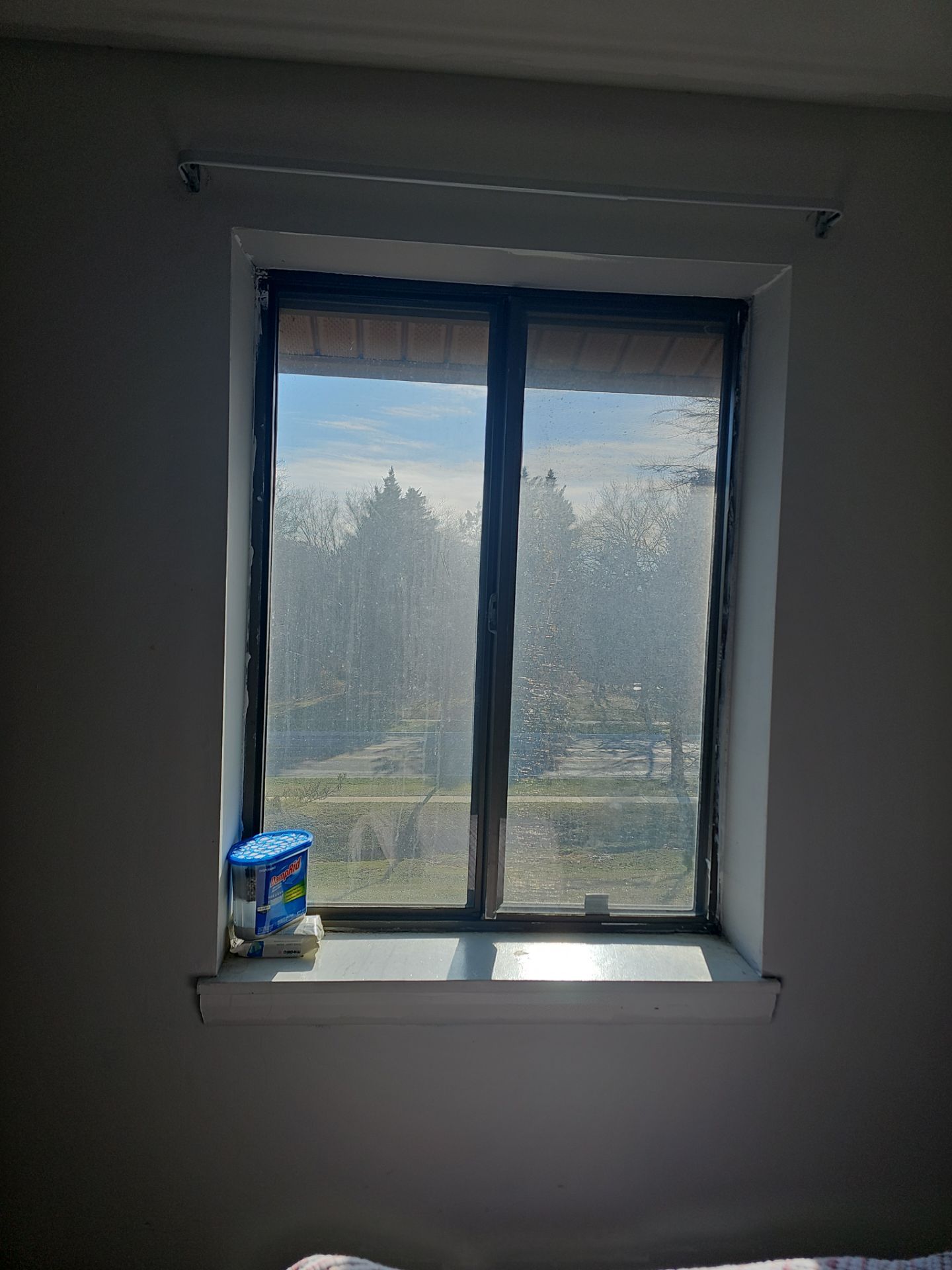 Bronze exterior Provia Sliding windows by Window Depot of Annapolis