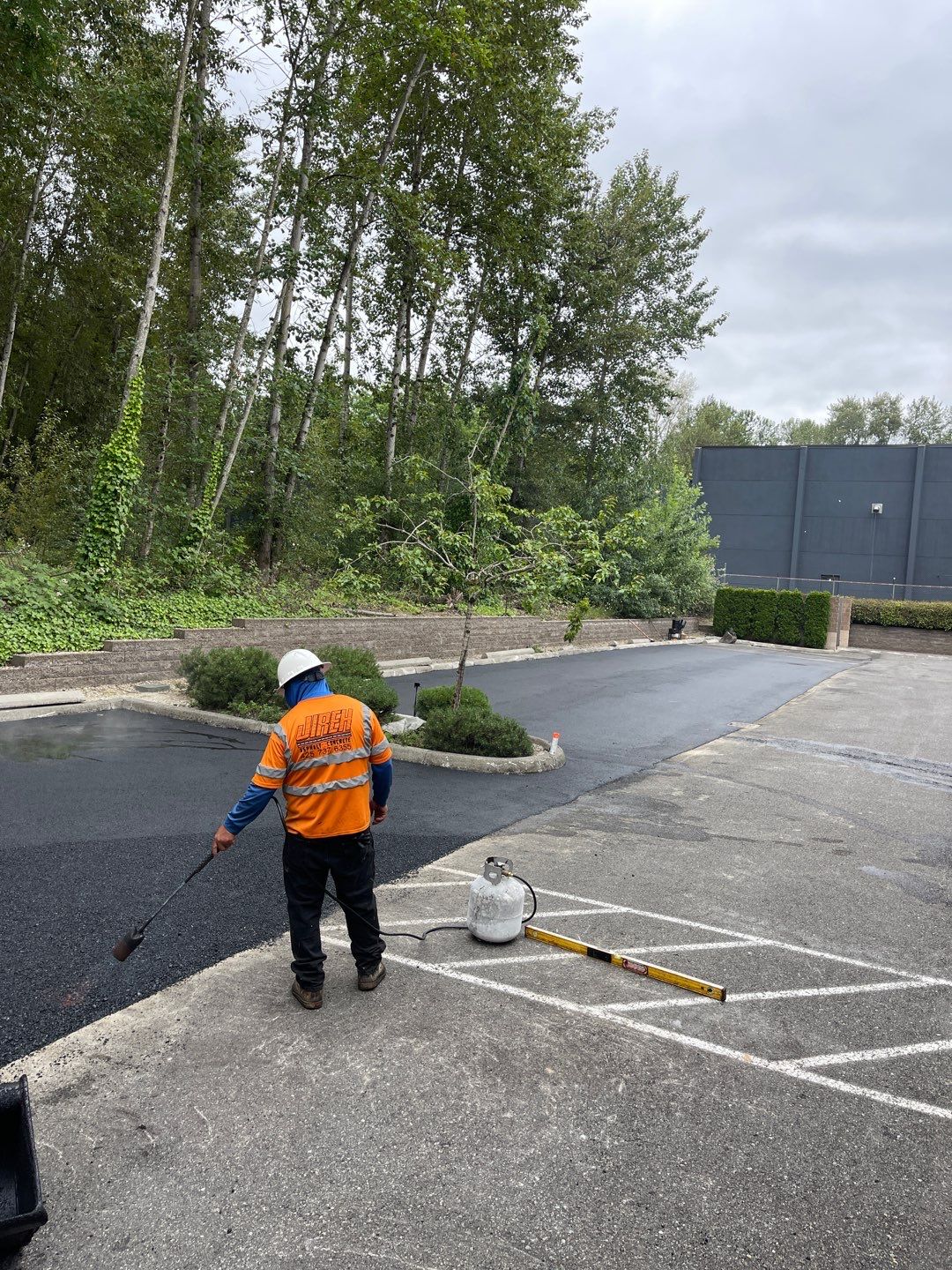 Asphalt Patch Repair & Concrete Curb Renovation | Kirkland  by Jireh Asphalt & Concrete Inc 