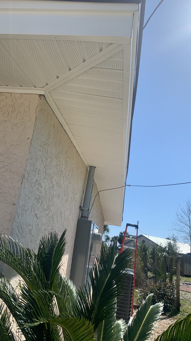 Soffit and Fascia Installation Using White Vinyl Soffit and Musket Brown Fascia by Gutter Professors
