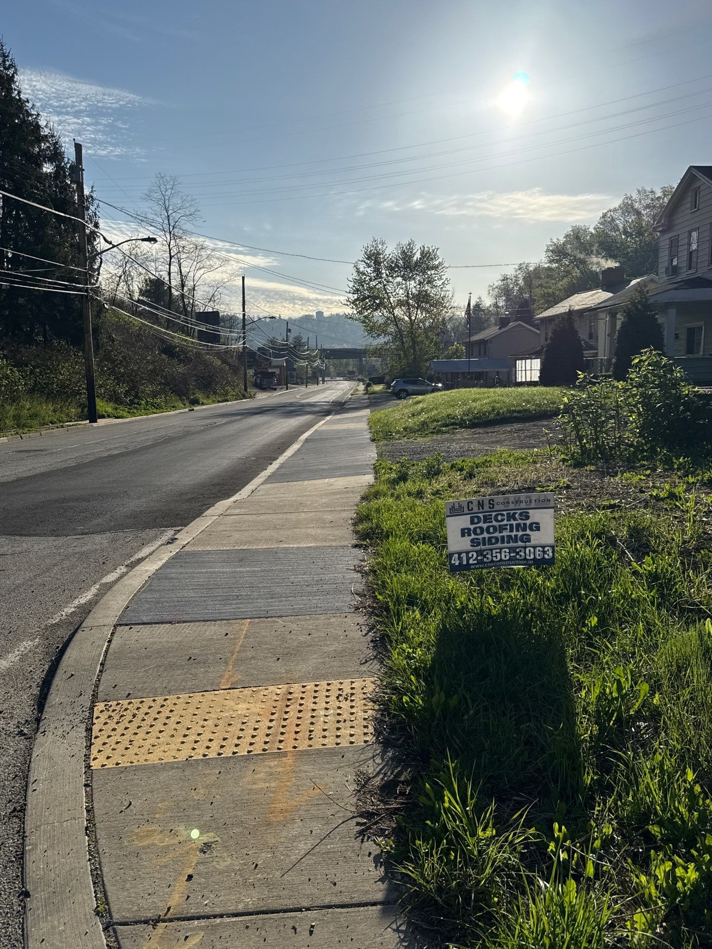 Roof sunspace deck  by Cousins Roofing Siding & Decks