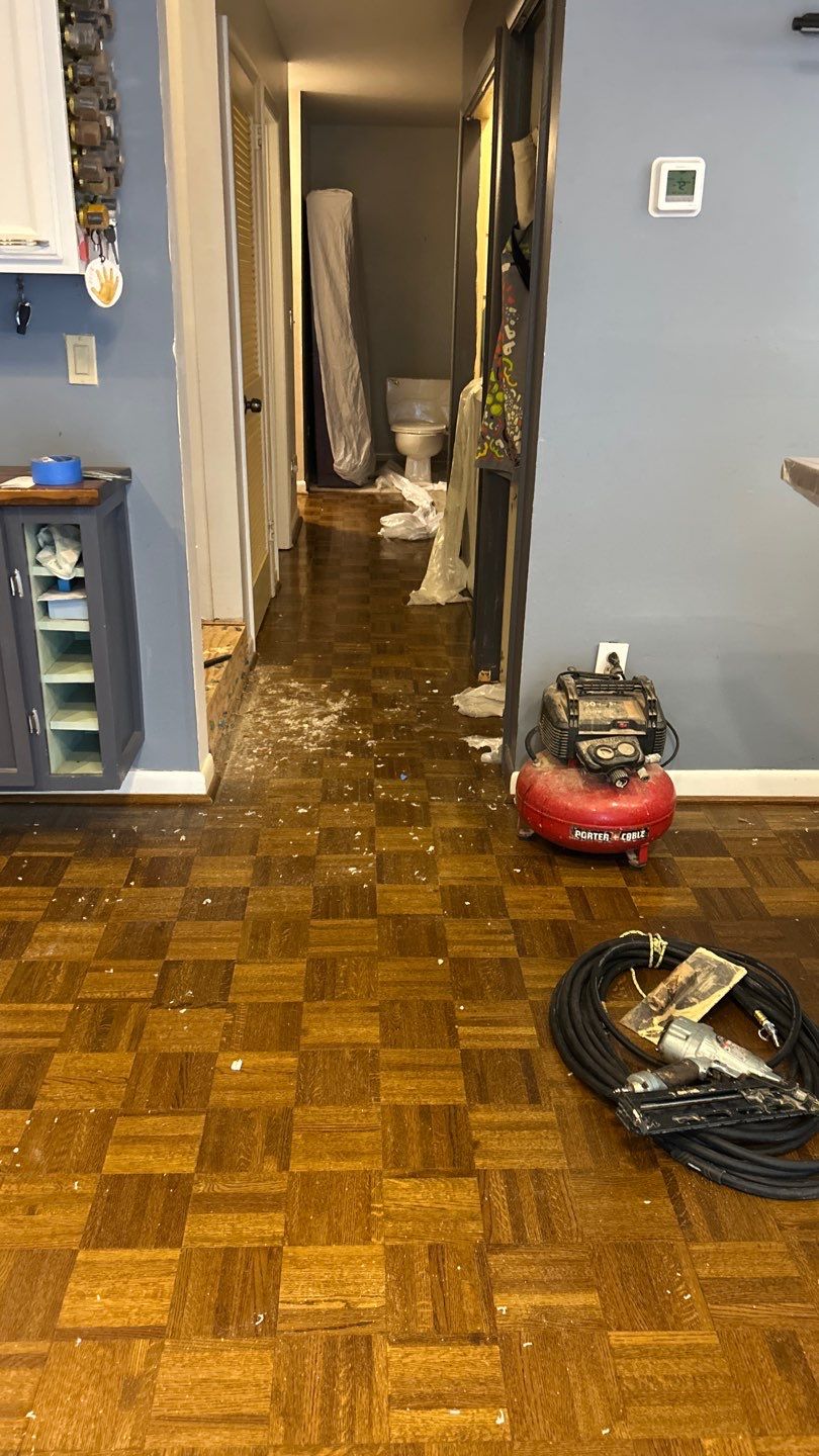 Parquet floor and stair treads by Footprints Floors of Nashville