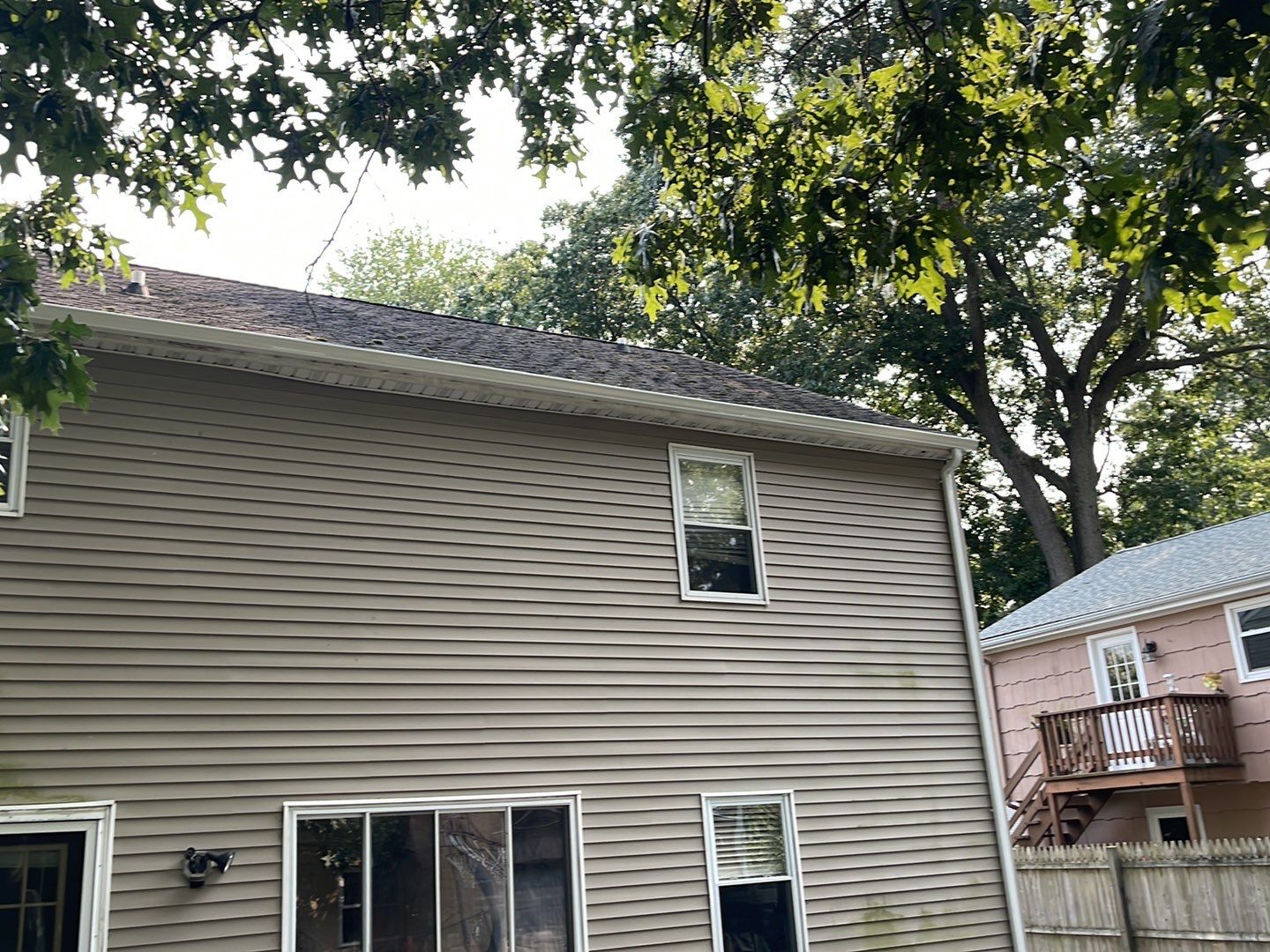 Gutter Installation using 5k White gutters by A Plus Exterior