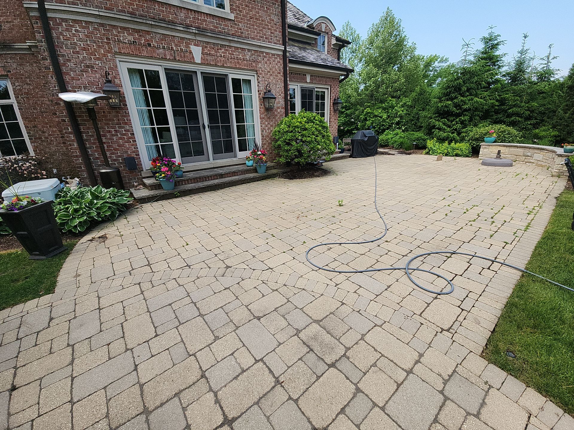 Brick paver repair, cleaning sanding and sealing by Northern Power Washing LLC.