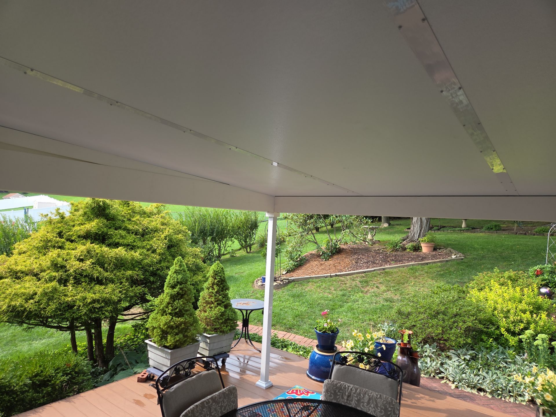 Composite Deck Build with Integrated Patio Cover in Washington by Cousins Roofing Siding & Decks
