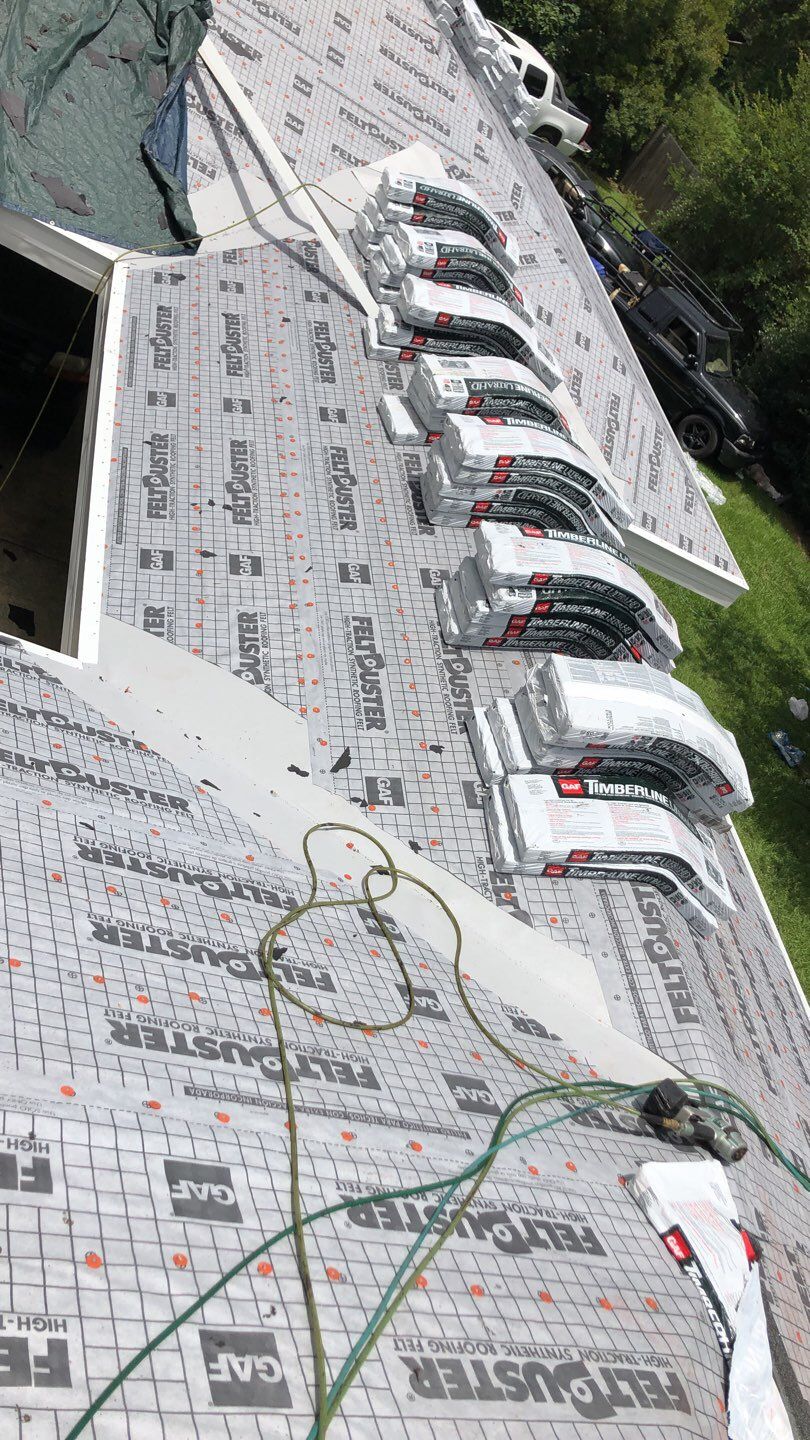 Residential Roofing Installation using Roof Replacement by American Roofing & Construction LLC