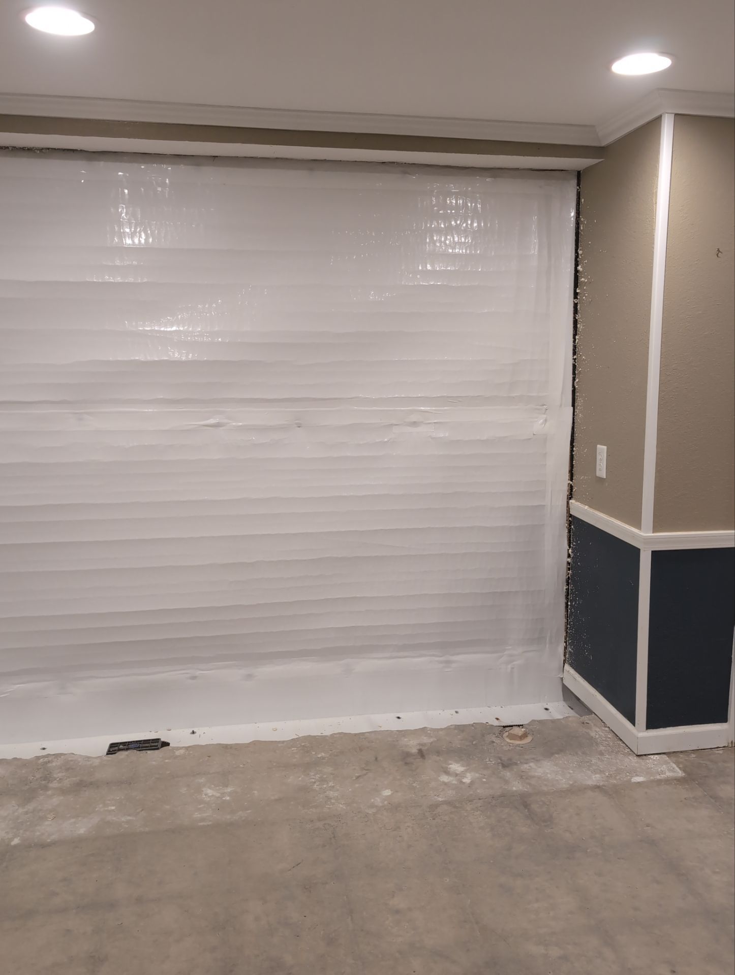 Interior Basement Waterproofing System and Egress Window Installation by Toledo Basement Repair 