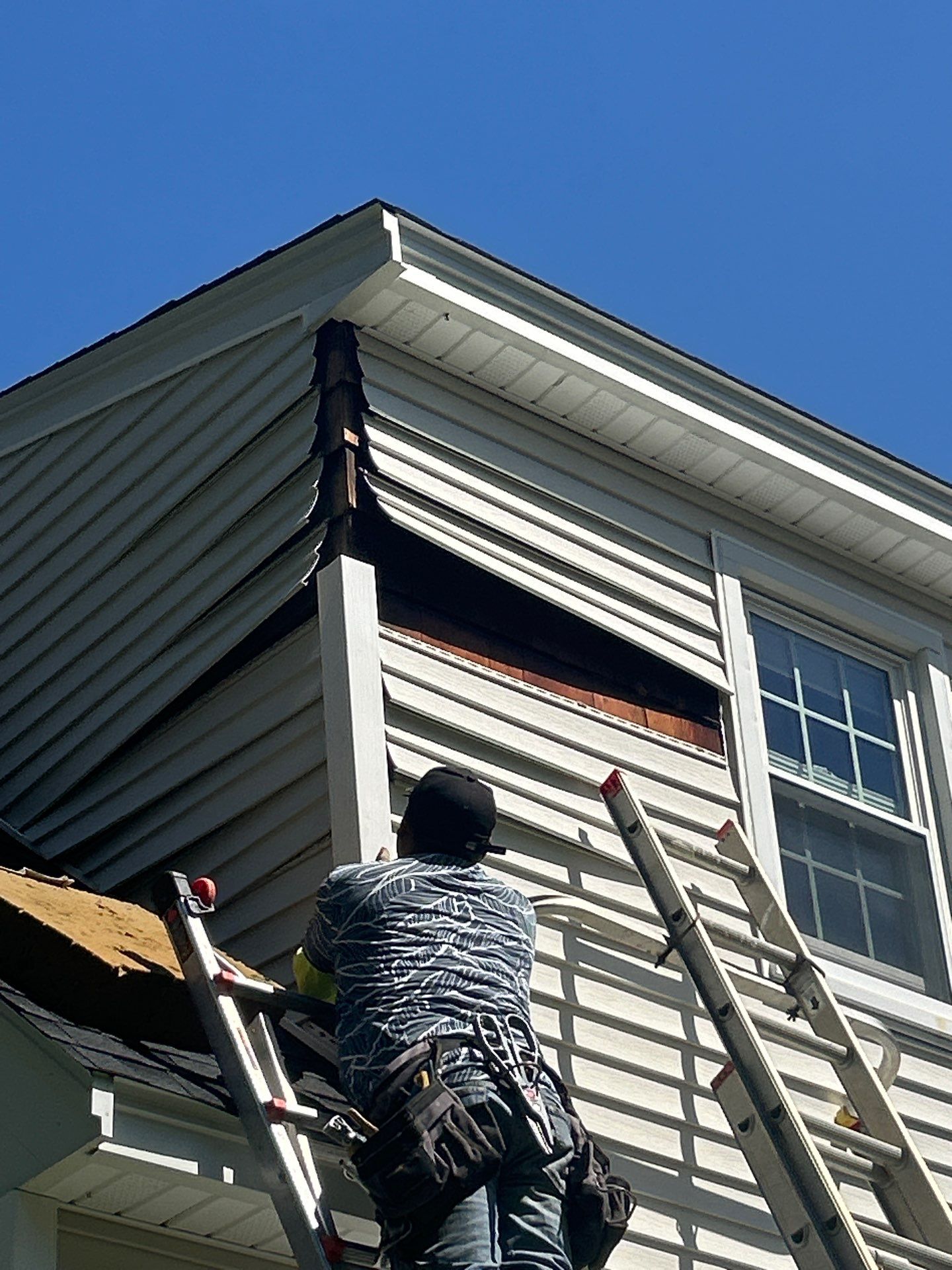 Vinyl Siding Repair with Spot Replacement by Mighty Dog Roofing of Greater Middlesex County