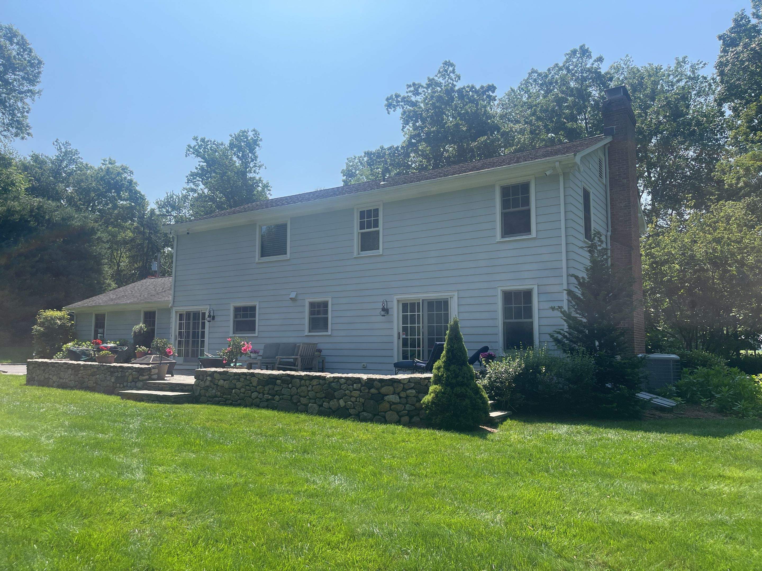 Gutter Installation using White gutters and roof clean up by A Plus Exterior