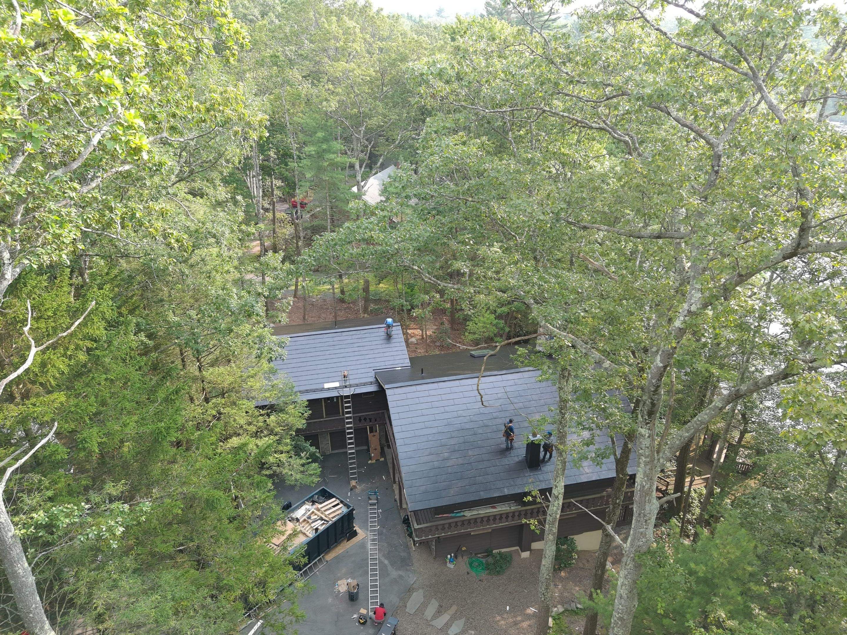 Stunning Tesla Solar Roof Cabin in the Woods by American Home Contractors