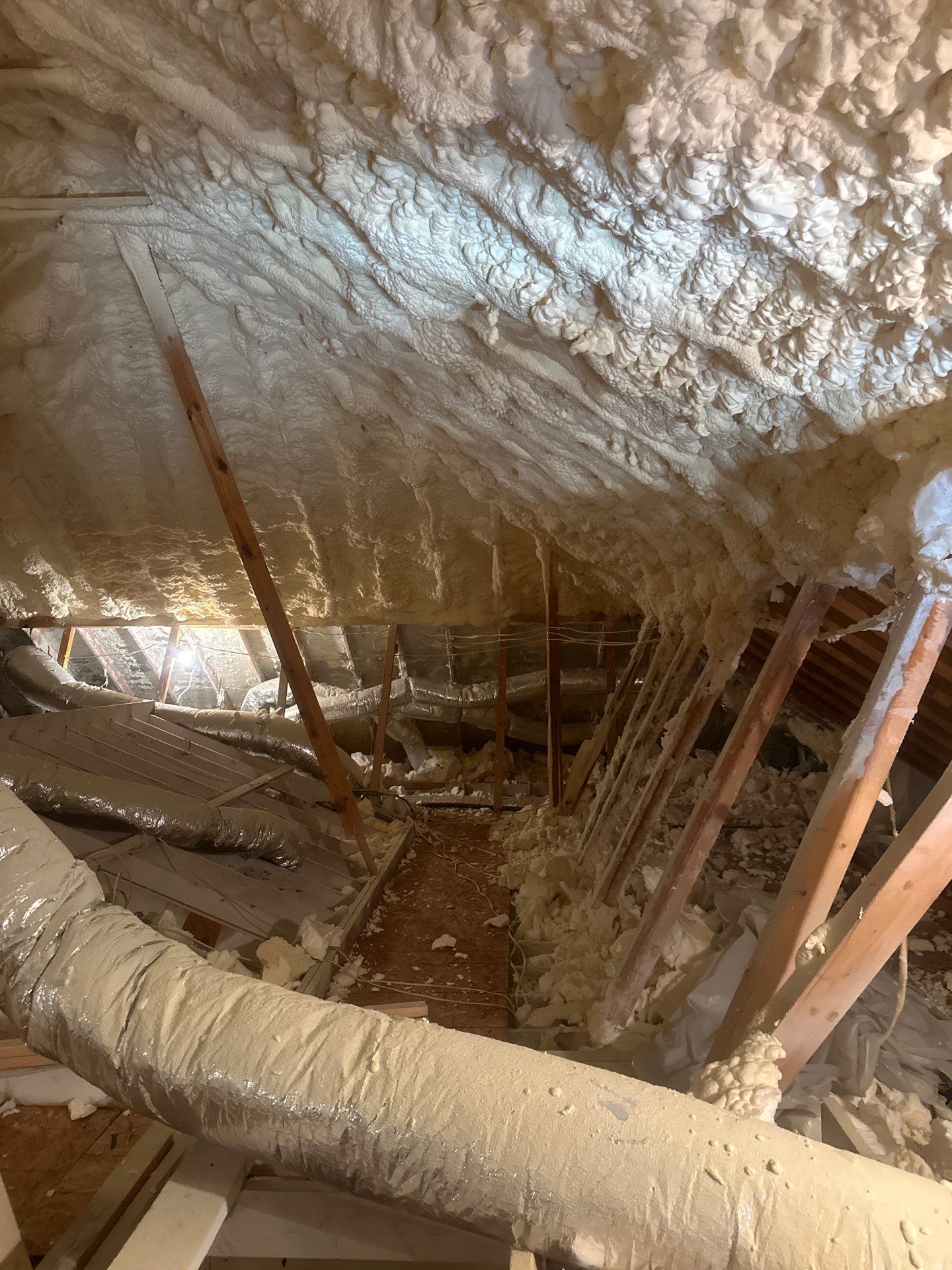 Spray foam insulation removal & re spray by Apex Insulation Solutions