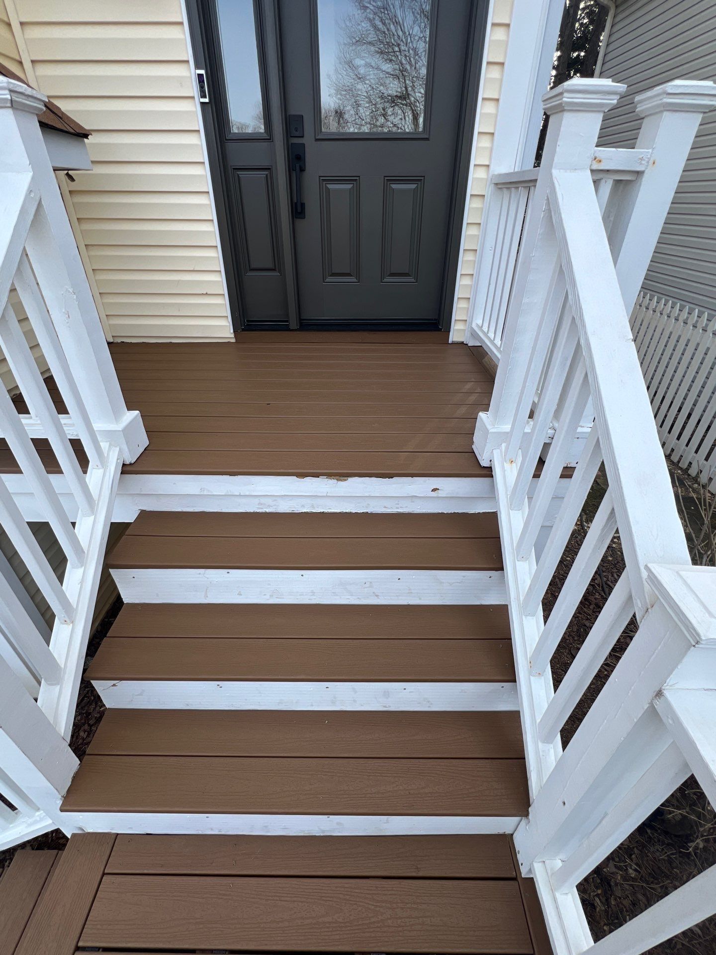 Composite Stair Tread and Railing Replacement in Marietta, Georgia by Swift Home Renovations
