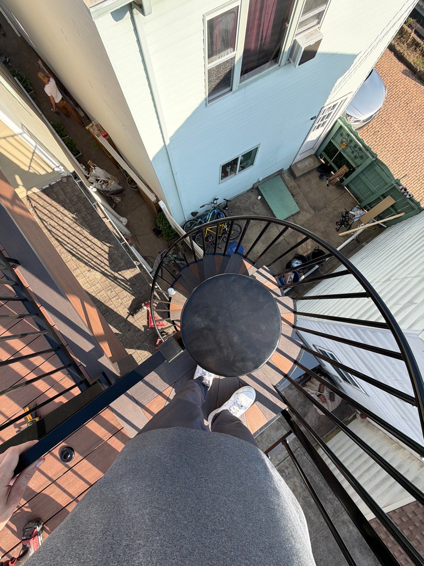 Elevated Multi-Level Composite Deck with Spiral Staircase in Pittsburgh by Cousins Roofing Siding & Decks