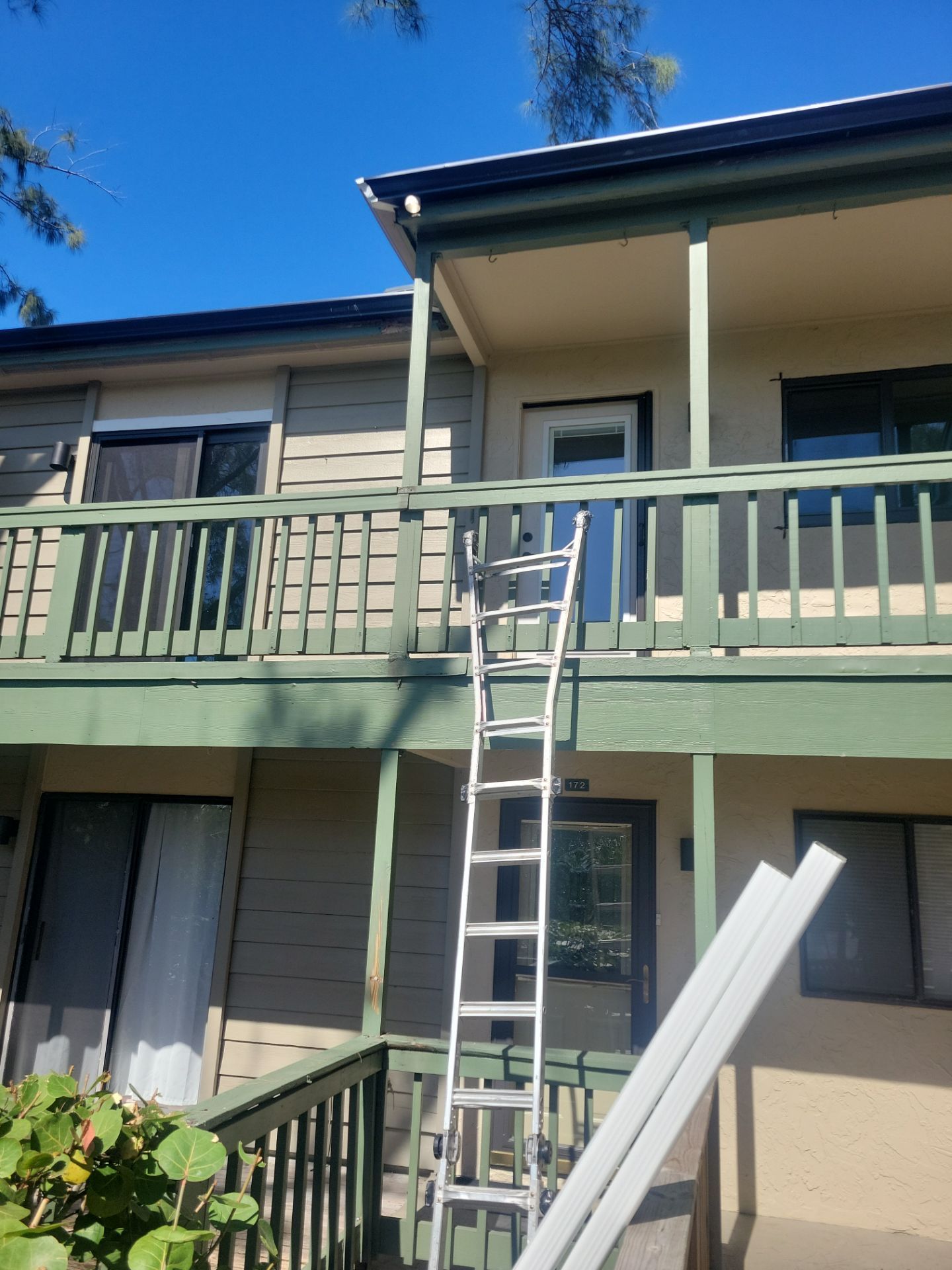 White Gutters Repair and Installation in Sarasota FL by Gutter Professors