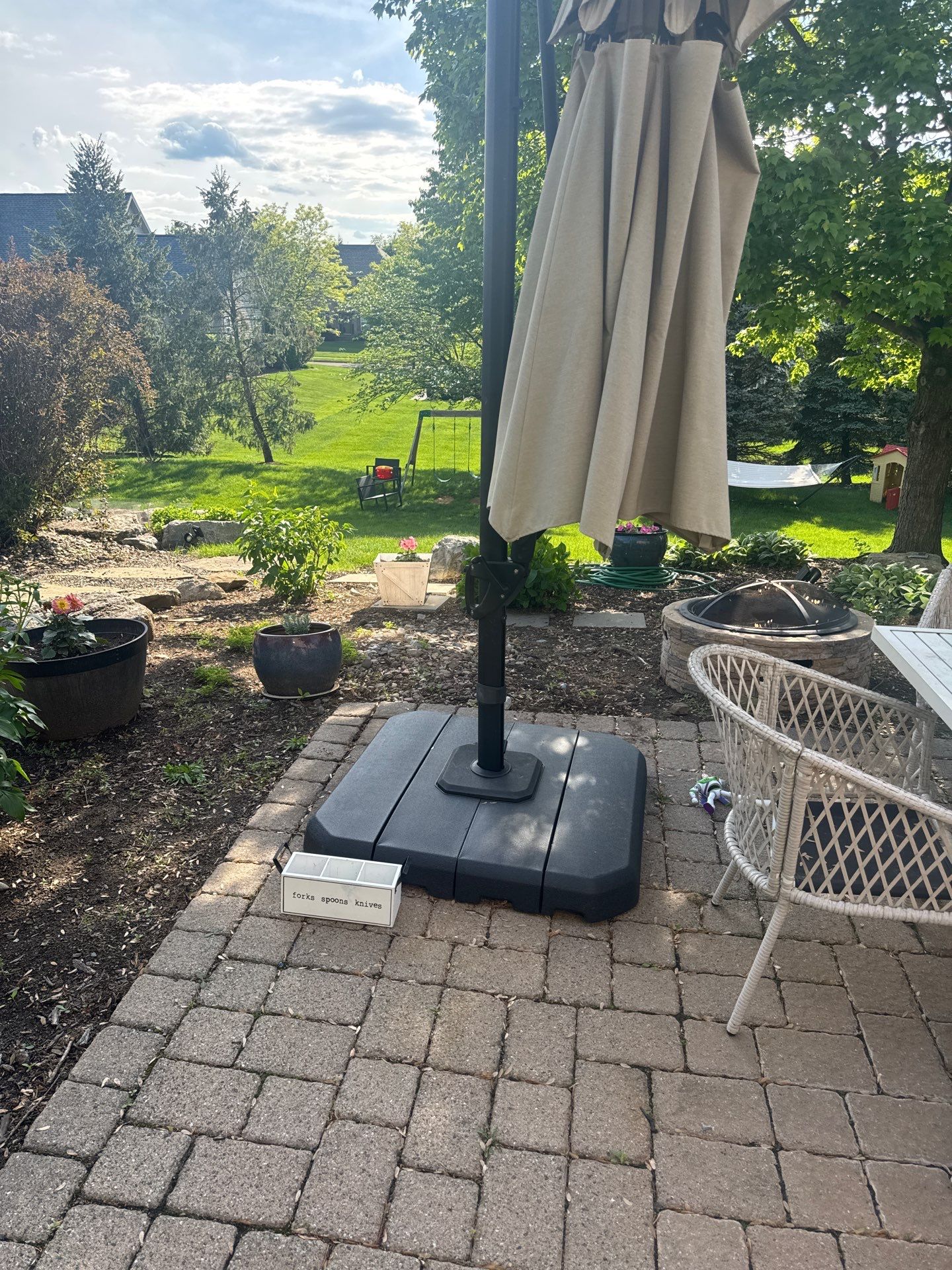 Backyard Retreat: Techo-Bloc Patio + Firepit Lounge by Saylor’s Lawn & Landscape