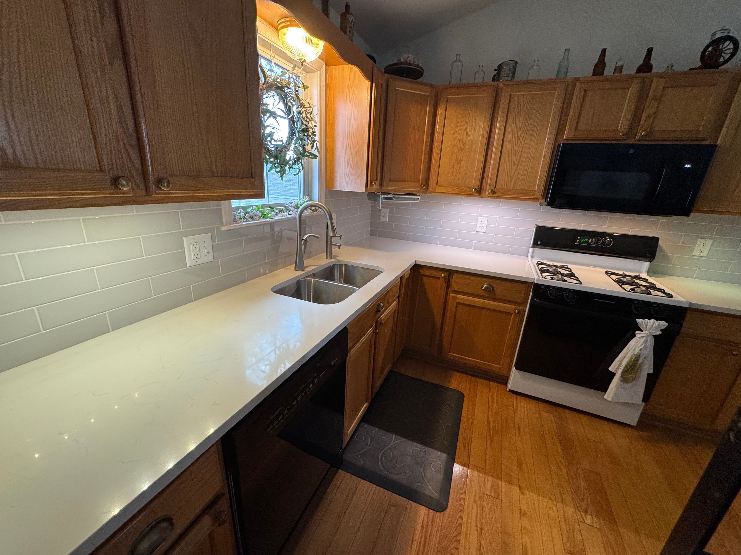 Little Kitchen Backsplash by Integrity Tile and Home LLC