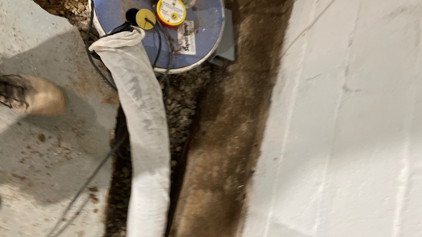 Interior Drain Tile & Yard French Drain in St. Paul, MN by Waterproofing Northeast