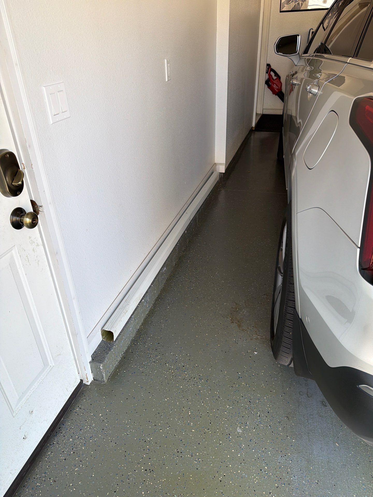 Multi-Car Garage Concrete Coating with Coyote Flake Finish in Sioux Falls by Select Painting, Coatings & Garage Cabinets