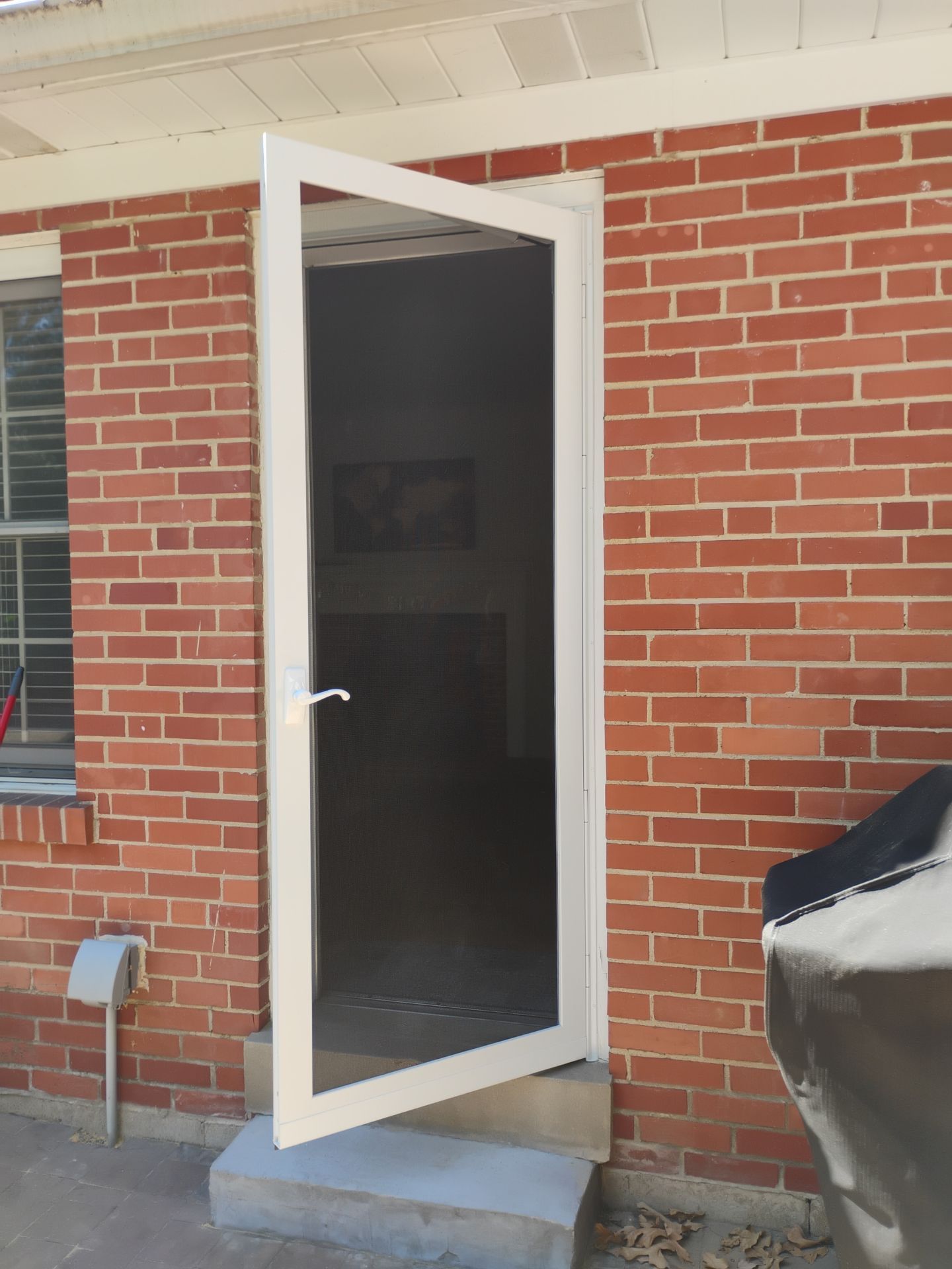 Dual Storm Door & Recessed Lighting Installation – St. Louis, MO by Legendary Services Company LLC.