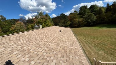 Roof Replacement using Owens Corning Sand Castle and Siding Replacement using Odyssey Plus D4" Wood Grain