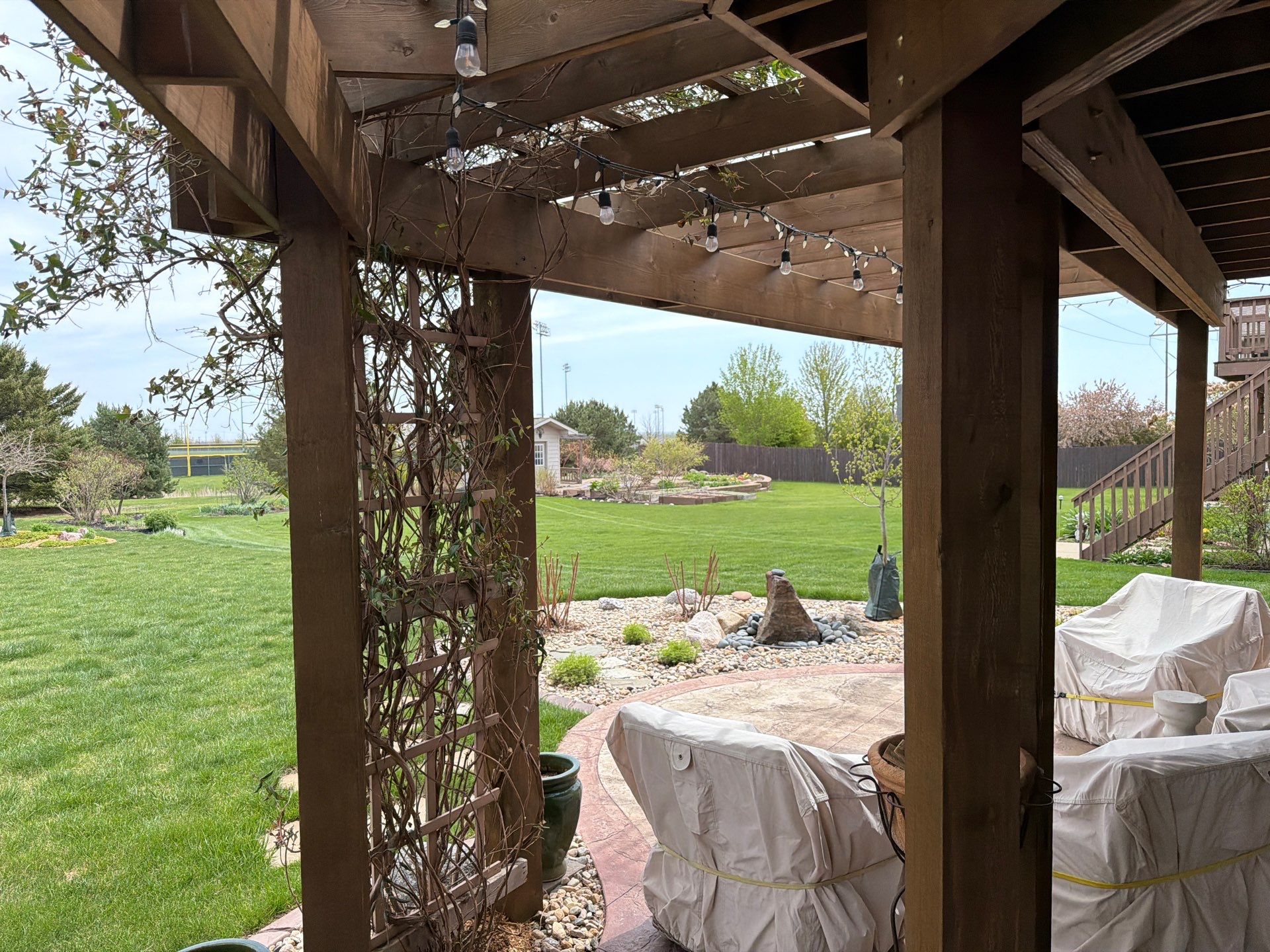 Tiered Wood Deck and Pergola Refinishing in Sioux Falls by Select Painting, Coatings & Garage Cabinets