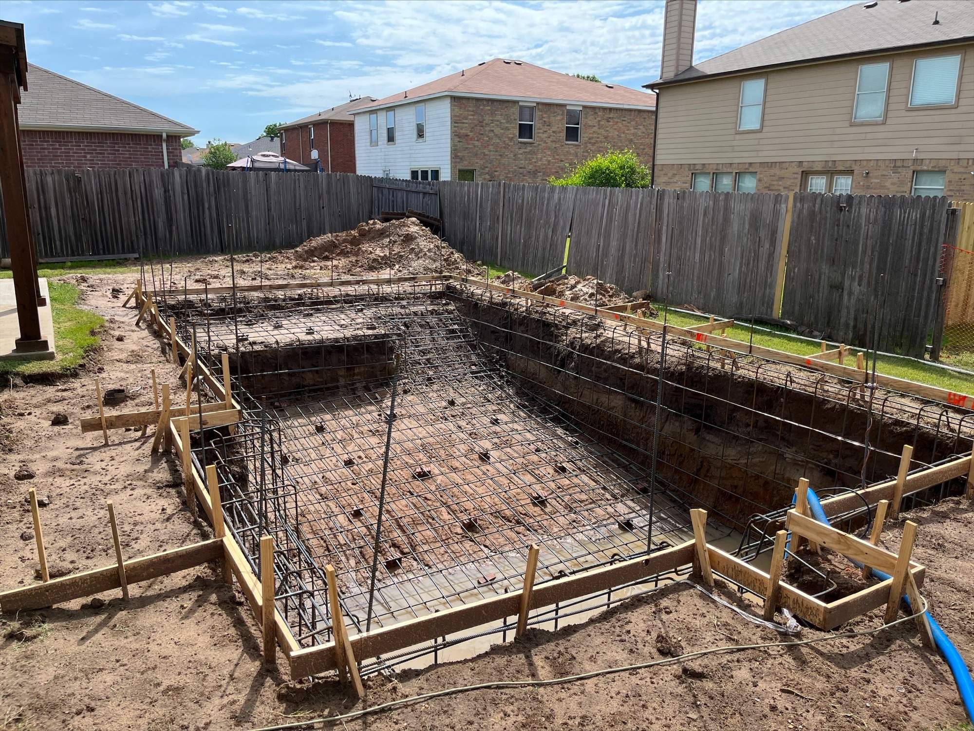 Geometric Pool with Tanning Ledge by Pinnacle Pools and Spas - DFW