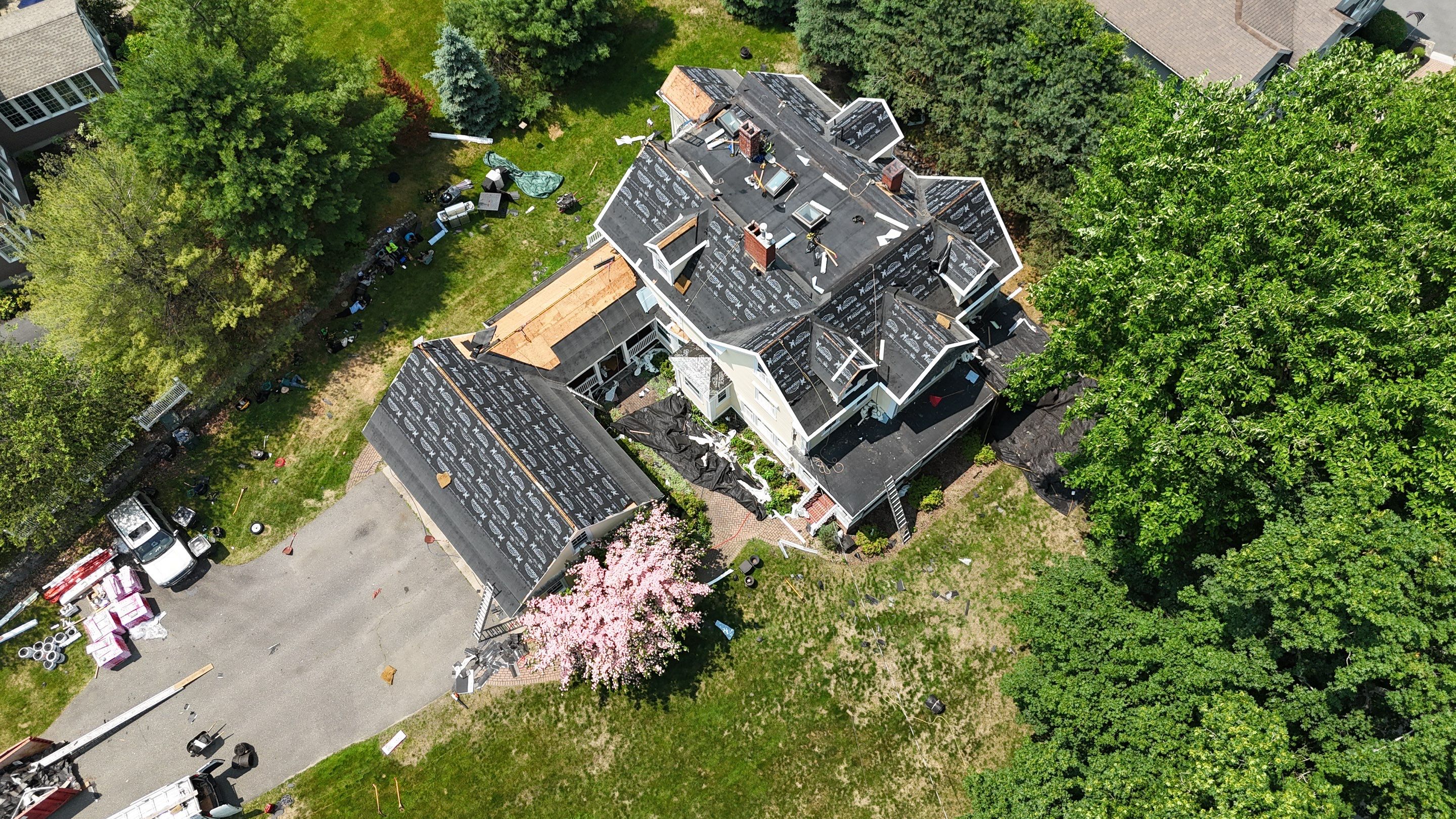 Full Roof Replacement & EPDM Restoration – North Andover, MA by Mighty Dog Roofing of Greater Middlesex County