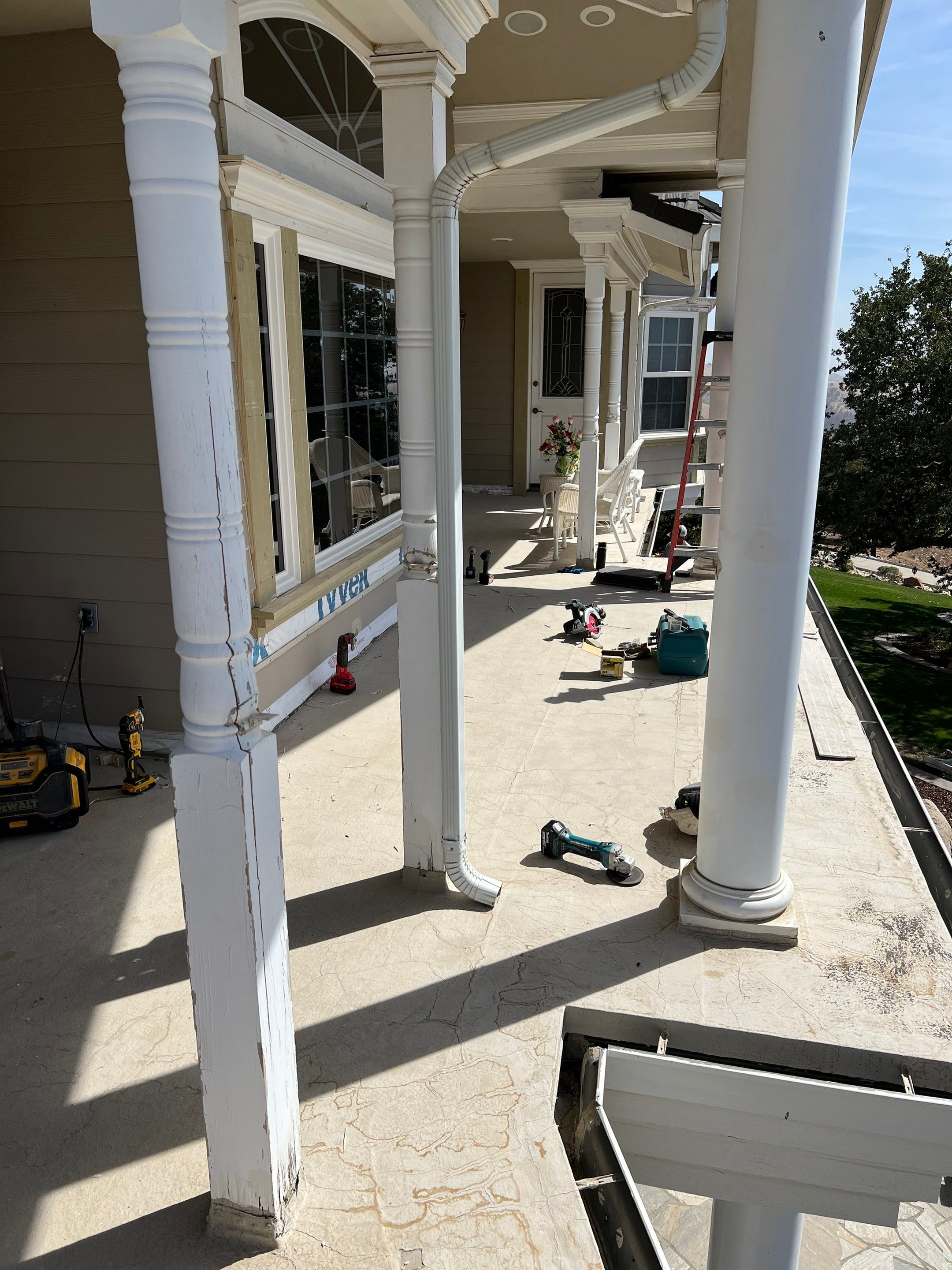 Sealant system over walk deck over house using Rubber coat and coatings by Straight Edge Roofing Inc