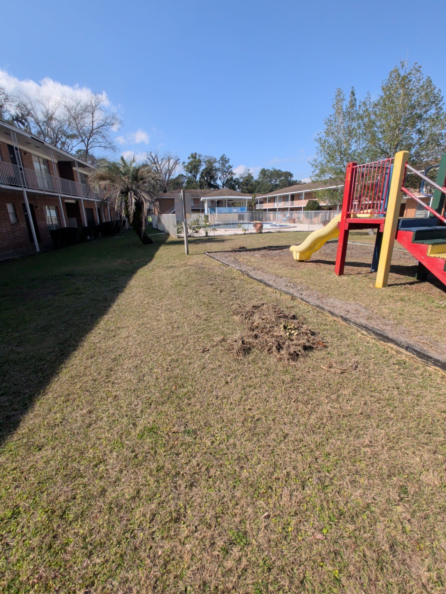 Apartment Landscape Cleanup & Ongoing Grounds Maintenance — Cimarron Apartments (Arlington) by Harmoni Home Services