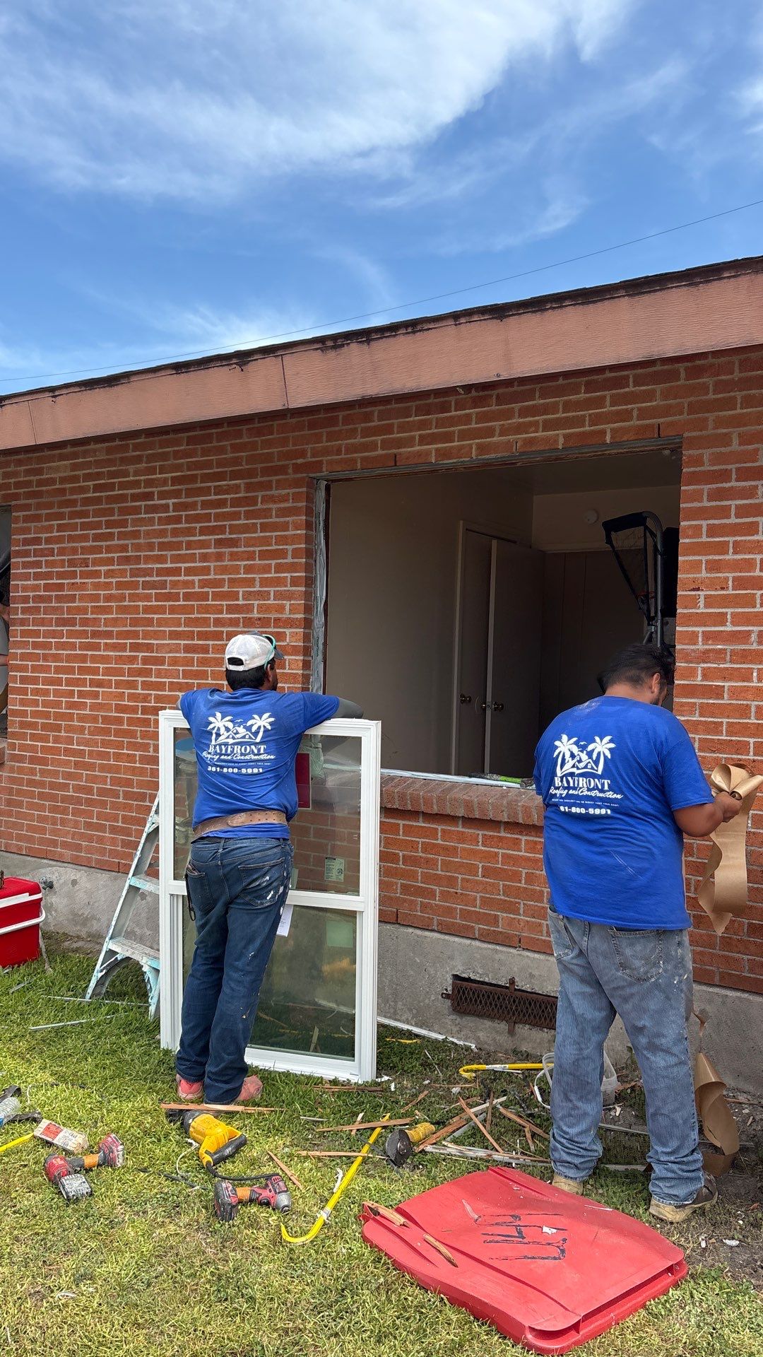 Installing Windows on a Submarine  by Bayfront Roofing and Construction