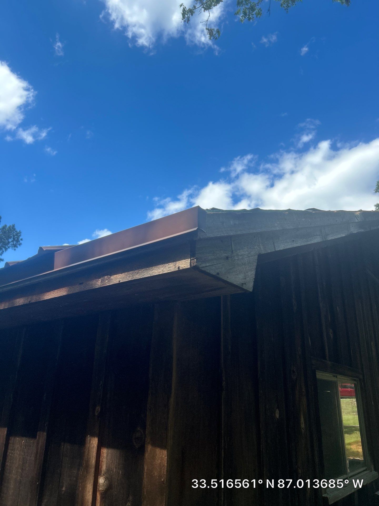 Metal Roof Replacement in Sylvan Springs (Brown) by The Roofing Dudes