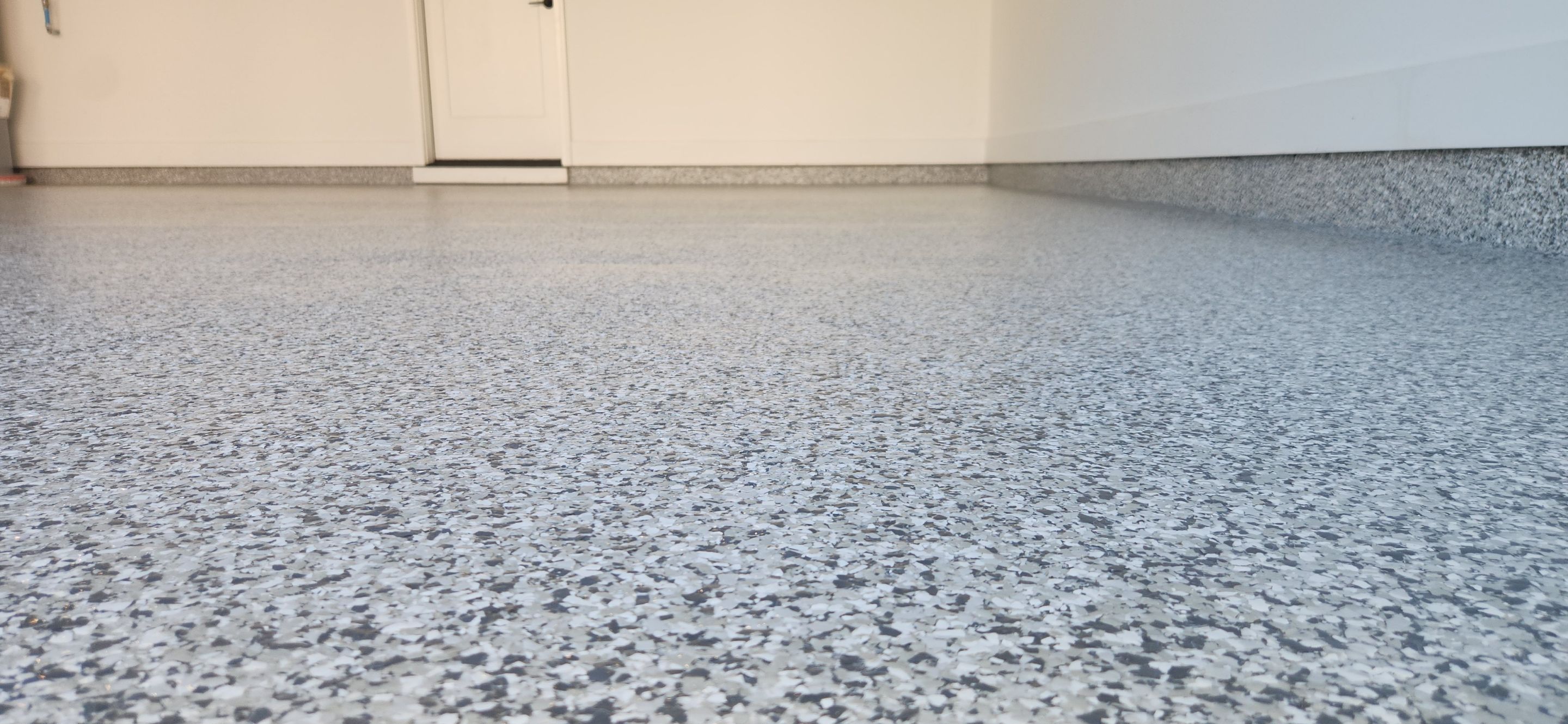 Garage using Gravel by Elite Floor Solutions