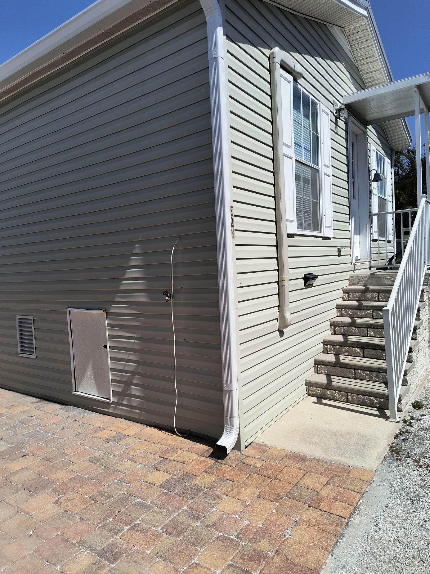 White K-Style Gutters for Beach Homes in Longboat Key FL by Gutter Professors