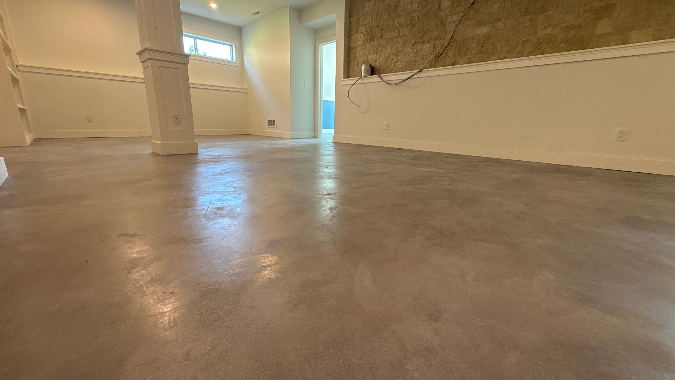 Basement Floor Overlay - Lawrence, KS by Big Red Decorative Concrete, LLC