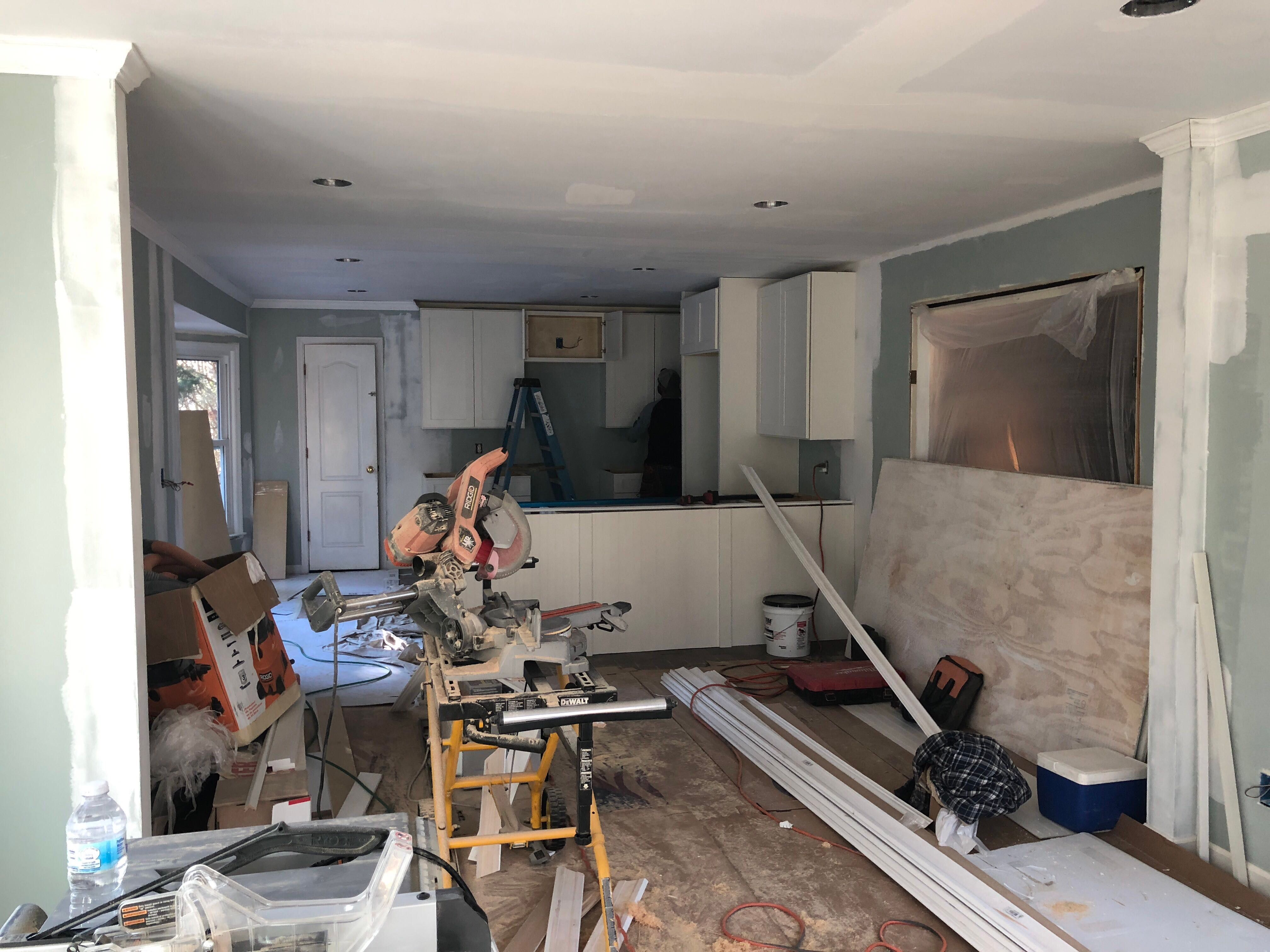 Open Concept Kitchen Remodel With White Shaker Cabinets in Kennesaw by Swift Home Renovations