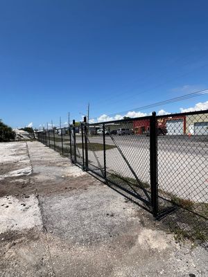 Chain-link Fence Installation using 6ft Black Chain Link Fence 