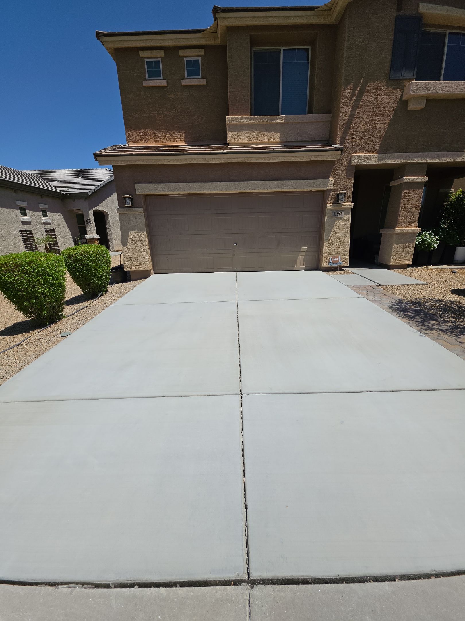 Driveway Oil Stain Removal in Del Rio Ranch, Avondale, AZ 85323 by Patriot Power Washing & Sanitation
