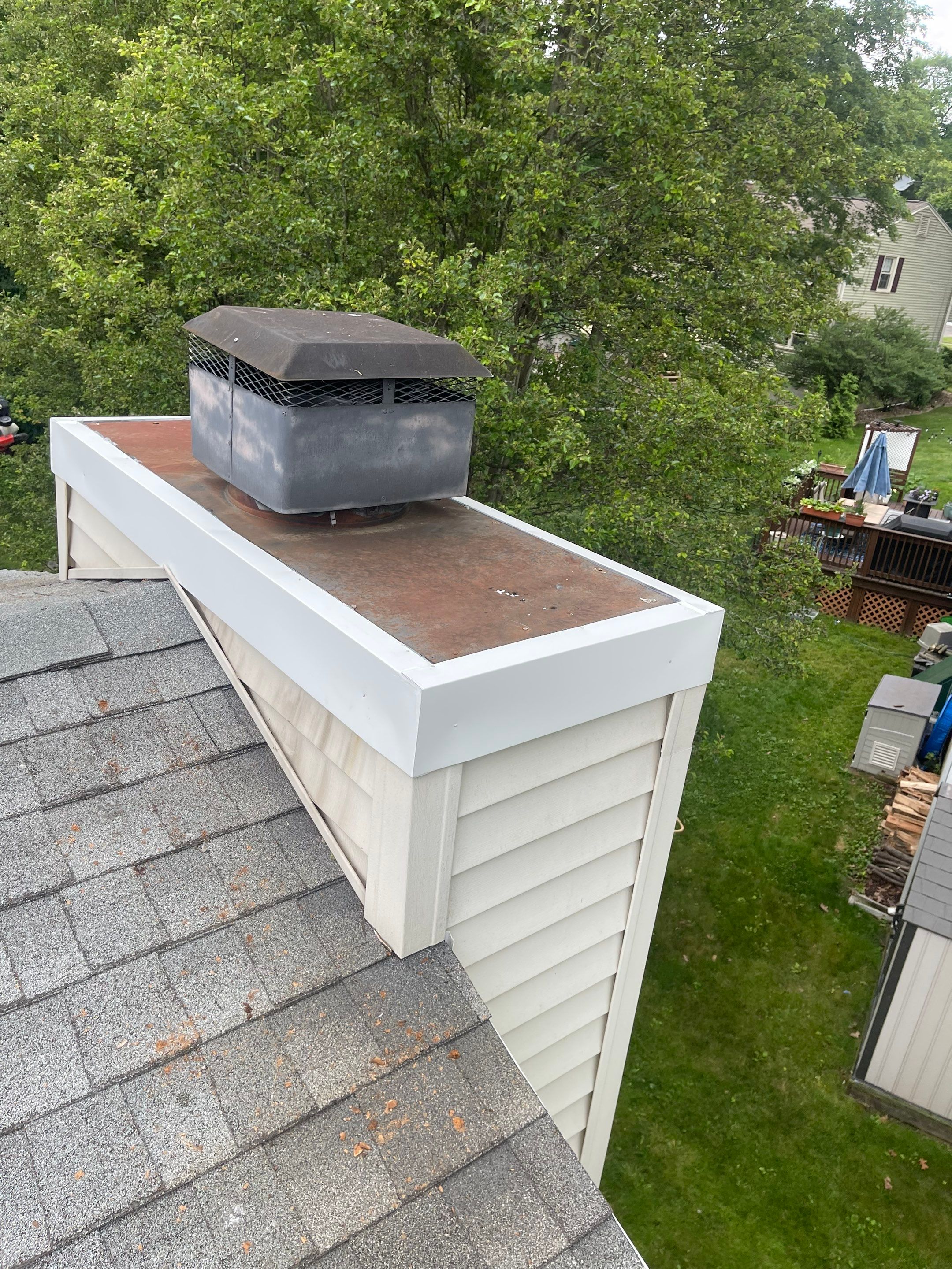 Gutter Cleaning Chimney top repair by A Plus Exterior