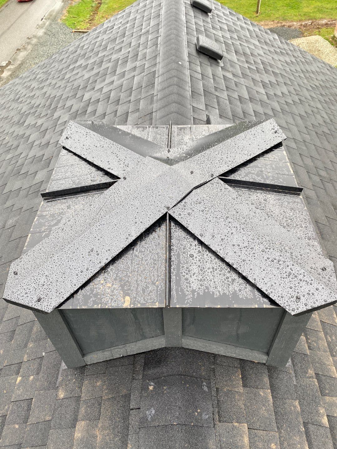 Residential Roofing Installation using 16" Prolok metal and Owens corning shingles by Top Notch Roofing Inc