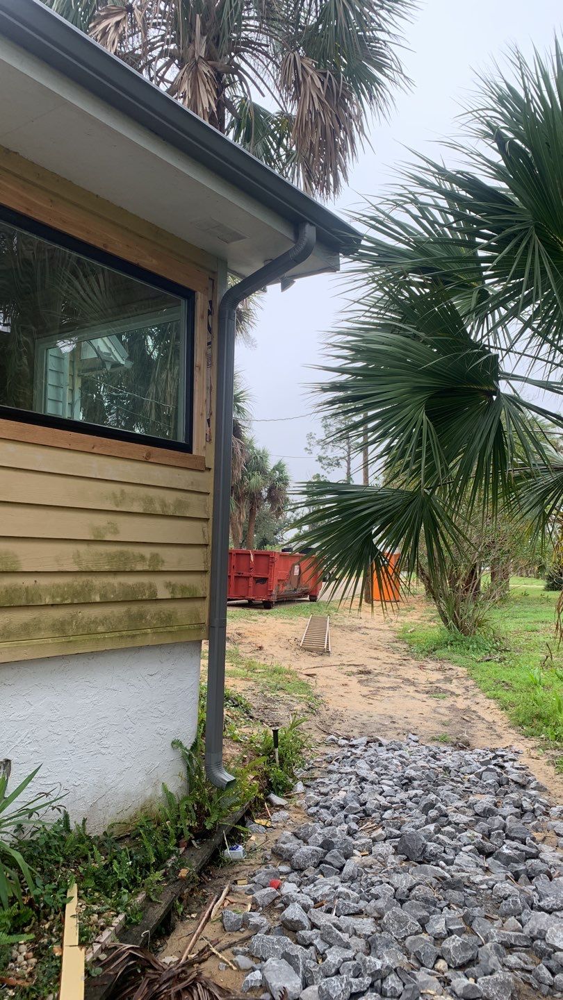 Seamless Gutter Installation using Charcoal Grey Gutters by Gutter Professors