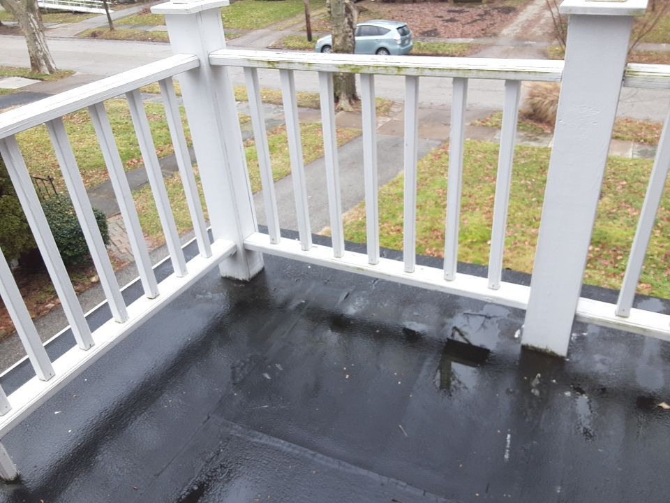 Residential Roof Replacement using Patio Roof by Absolute Roofing and Construction