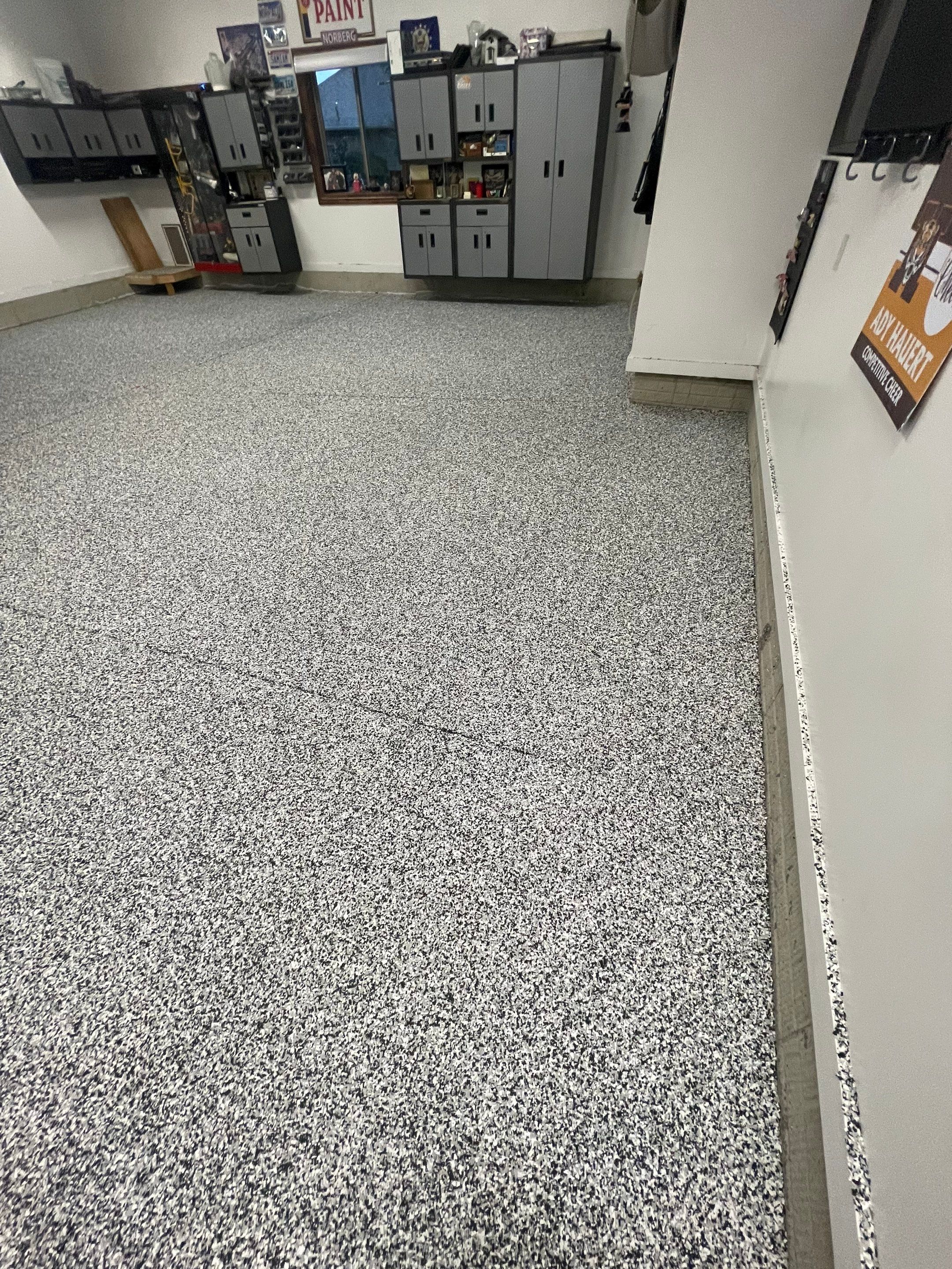Garage Floor Coating and Domino Flake Finish in Sioux Falls by Select Painting, Coatings & Garage Cabinets