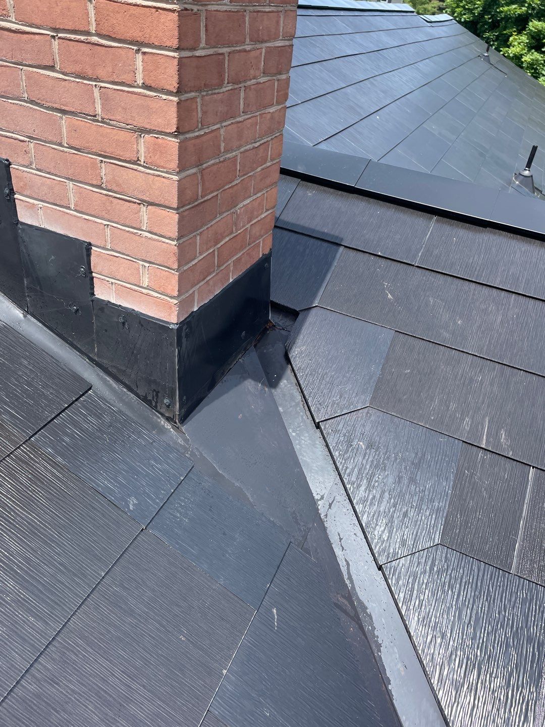 Tesla Solar Roof Installation by American Home Contractors