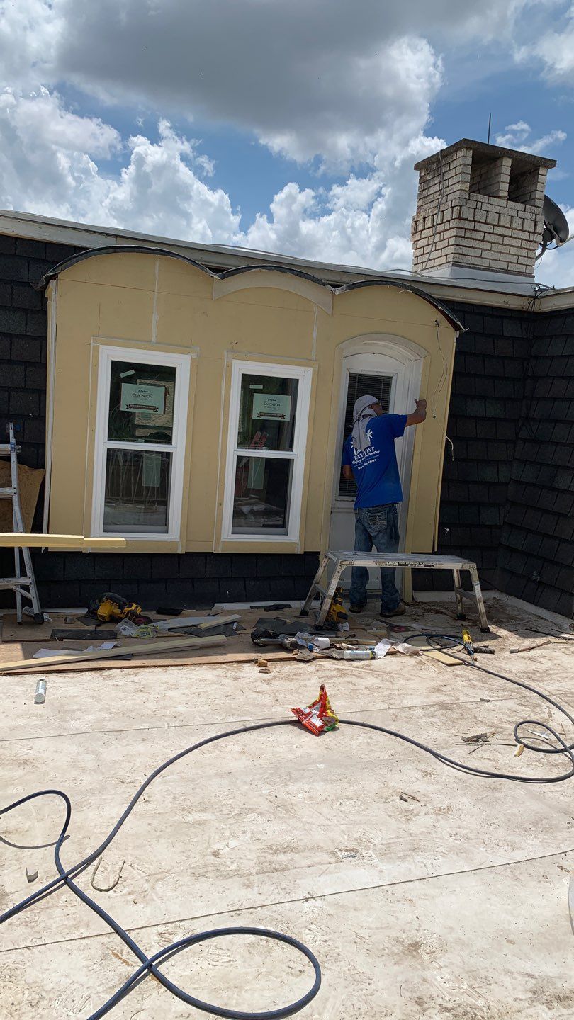 Mansard Charm by Bayfront Roofing and Construction