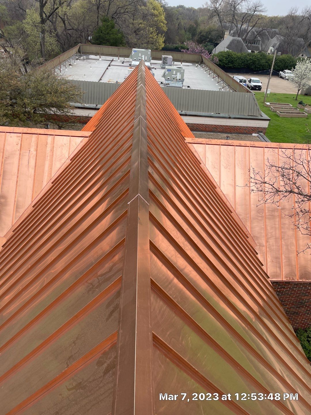 Custom Copper Standing Seam Roofing System  by Springtree Restoration 