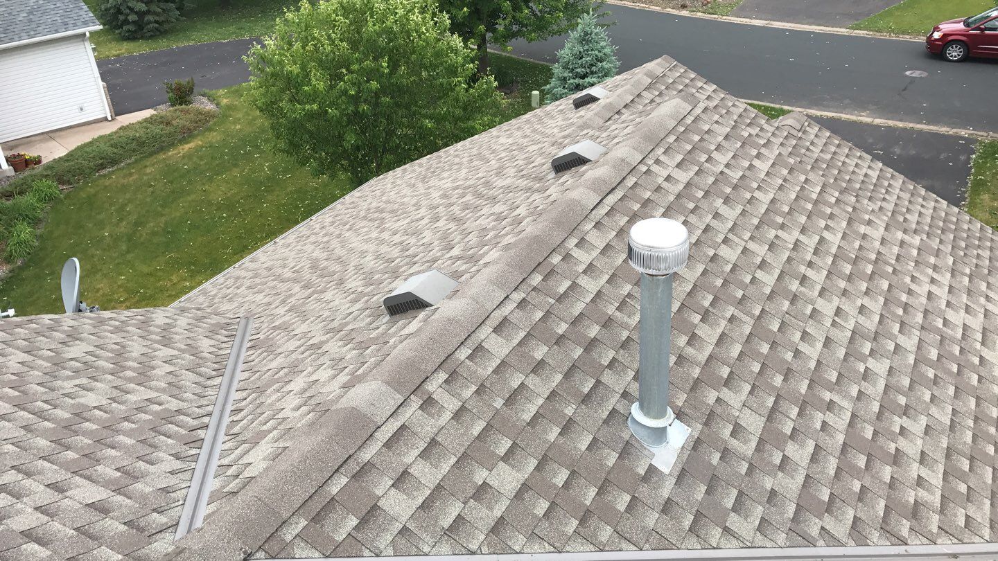 Storm Damage Restoration using Atlas Pinnacle Shingles and Mastic Vinyl Siding  by MODERN EXTERIOR SYSTEMS