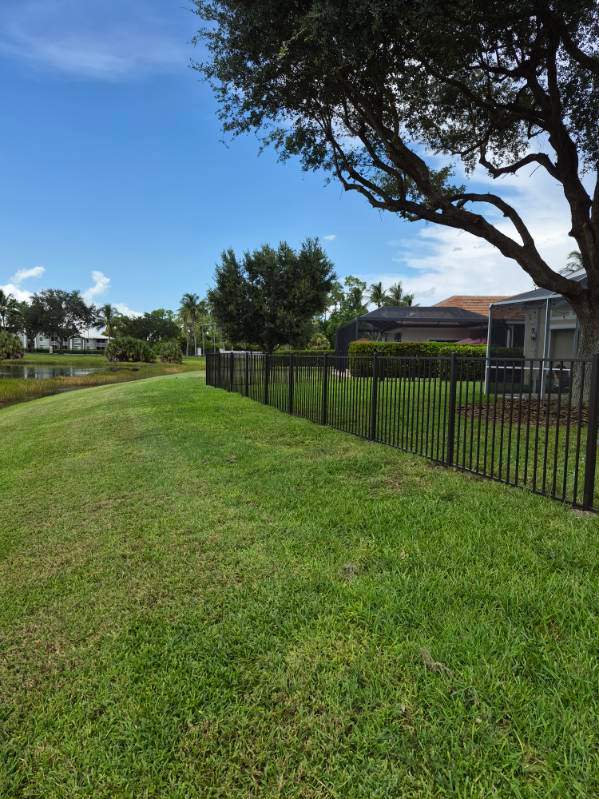 Bronze Aluminum Perimeter Fence Installation in Fort Myers by True Fence LLC