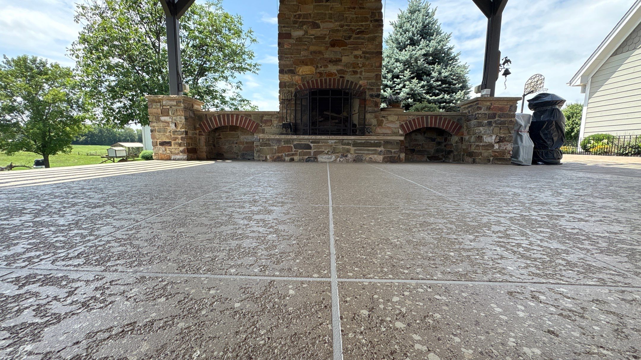 Custom Back Patio Resurface - Kearney, MO by Big Red Decorative Concrete, LLC