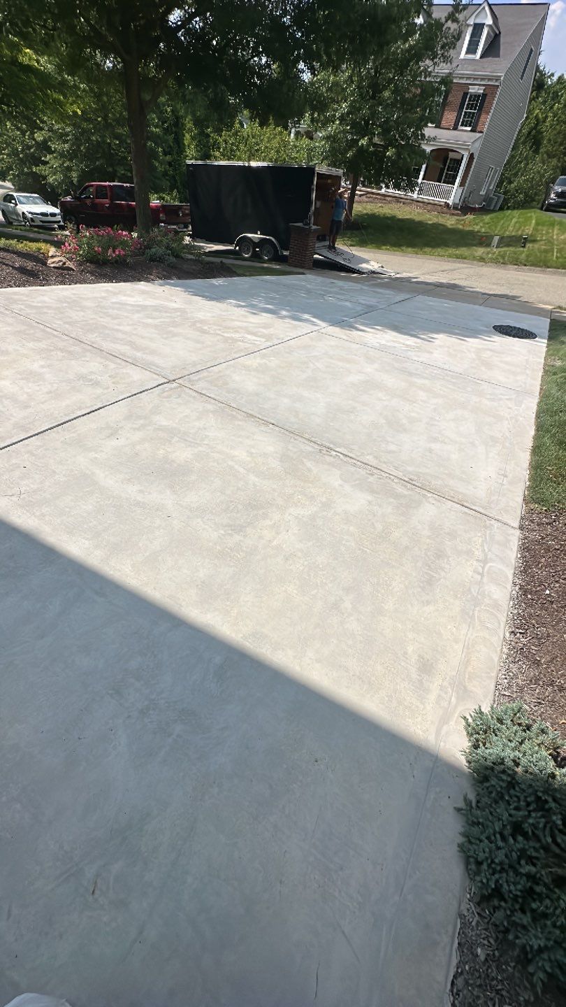 Pool Deck + Driveway + Garage Project in Venetia by Floors in a Day, Inc