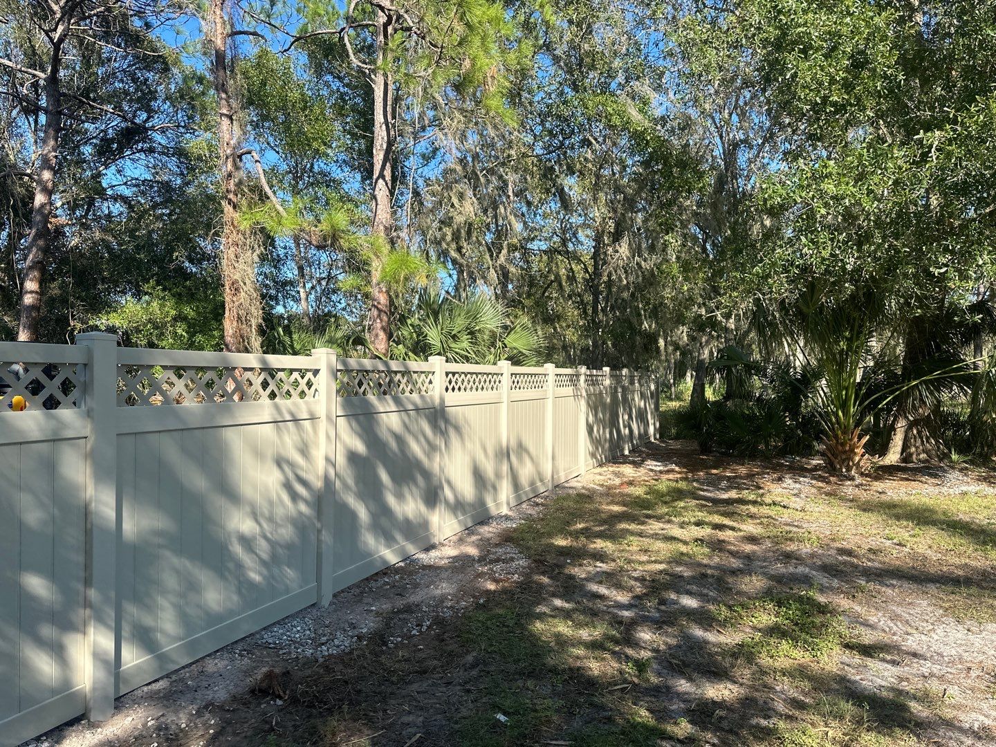 Vinyl Fence Installation using 6Ft Tan Vinyl Privacy Fence with Lattice Top by Asap fence and gates, LLC
